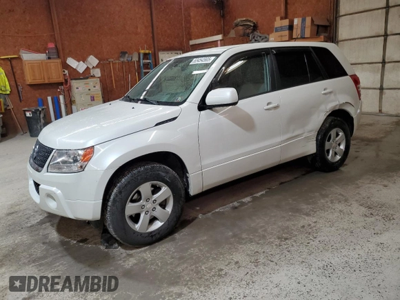 2012 Suzuki Grand Vitara Premium z VIN JS3TD0D66C4100845, wystawiony jako Copart lot #53454565 z przebiegiem 106 415 mil mil oraz Szkoda całkowita • Salvage title. Historia ofert i sprzedaży dostępna na DreamBid. Obrazek 1.