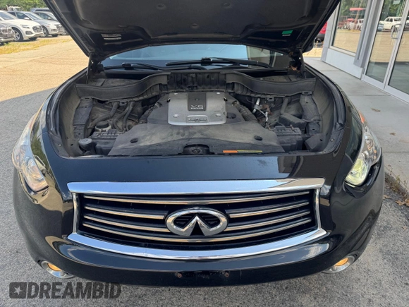 2014 Infiniti QX70 с VIN JN8CS1MW1EM411715, выставлен на аукционе Copart как лот 65465775 с пробегом 180 472 миль миль и Чистый • Clean title. История ставок и продаж доступна на DreamBid. Изображение 7.