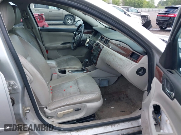 2009 Chevrolet Impala LT with VIN 2G1WT57K991228661, listed as a IAAI auction lot 42001074 with 104,918 mi miles and . Bid and sale history available at DreamBid. Image 5.