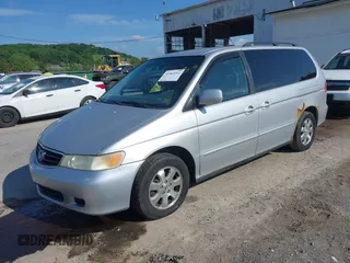 2004 Honda Odyssey EX z VIN 5FNRL18614B037143, wystawiony jako IAAI lot #42362262 z przebiegiem 203 023 mil mil oraz . Historia ofert i sprzedaży dostępna na DreamBid. Obrazek 2.