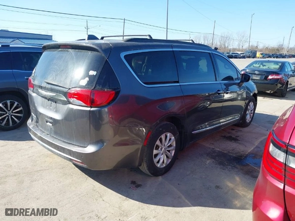 2017 Chrysler Pacifica Touring-L with VIN 2C4RC1BG9HR590876, listed as a IAAI auction lot 41758151 with NaN miles. Bid and sale history available at carsss.com. Image 4.