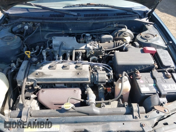 1997 Toyota Corolla with VIN 1NXBA02E7VZ601593, listed as a IAAI auction lot 42771723 with 247,823 mi miles and . Bid and sale history available at DreamBid. Image 6.