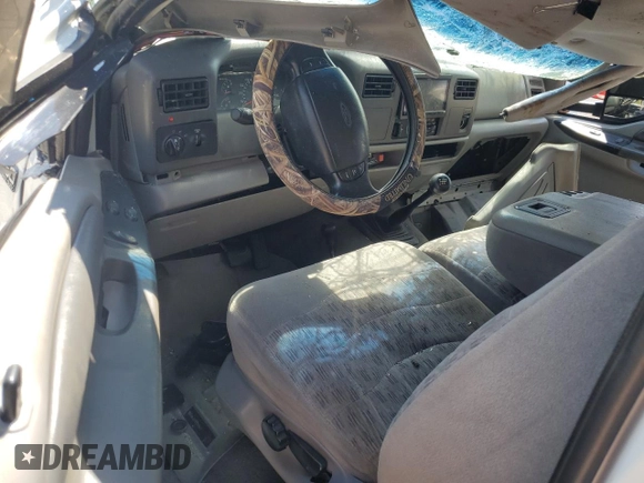 1999 Ford Super Duty F-250 XL with VIN 1FTNX21F3XEA71139, listed as a Copart auction lot 67062114 with 203,233 mi miles and Salvage Title. Bid and sale history available at carsss.com. Image 8.
