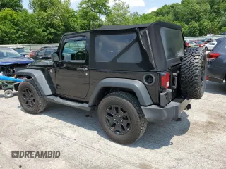 2015 Jeep Wrangler Freedom Edition with VIN 1C4AJWAG8FL688255, listed as a Copart auction lot 59722165 with 130,666 mi miles and Salvage title. Bid and sale history available at DreamBid. Image 2.