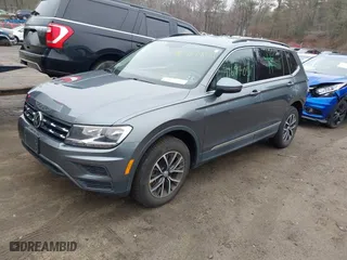 2020 Volkswagen Tiguan SE with VIN 3VV2B7AX2LM086678, listed as a IAAI auction lot 41694051 with 59,495 mi miles. Bid and sale history available at carsss.com. Image 2.