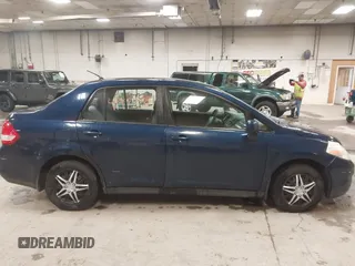 2009 Nissan Versa 1.8 S with VIN 3N1BC11E79L440560, listed as a IAAI auction lot 41975289 with 158,726 mi miles. Bid and sale history available at carsss.com. Image 14.