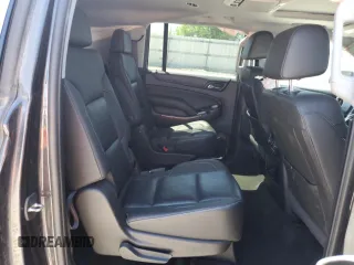 2018 Chevrolet Suburban Premier z VIN 1GNSKJKC5JR187207, wystawiony jako Copart lot #57348895 z przebiegiem 171 712 mil mil oraz Nie do naprawy • Non repairable. Historia ofert i sprzedaży dostępna na DreamBid. Obrazek 11.
