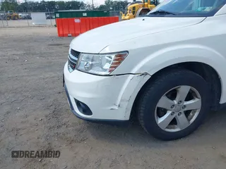 2012 Dodge Journey SXT with VIN 3C4PDDBG3CT307500, listed as a IAAI auction lot 42728446 with 122,072 mi miles and . Bid and sale history available at DreamBid. Image 6.