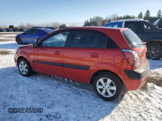 2009 Kia Rio LX with VIN KNADE243596567394, listed as a Copart auction lot 42240065 with 160,044 mi miles and Salvage Title. Bid and sale history available at carsss.com. Image 2.