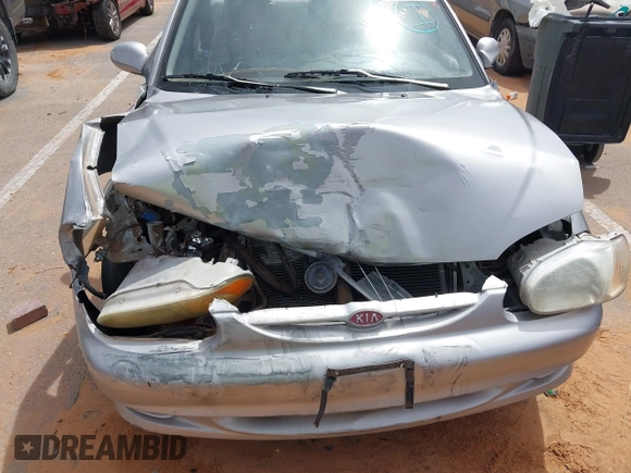 2001 Kia Sephia with VIN KNAFB121815081573, listed as a IAAI auction lot 42058297 with 112,069 mi miles and . Bid and sale history available at DreamBid. Image 6.