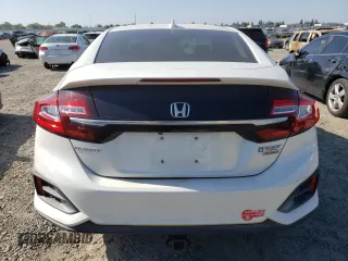 2018 Honda Clarity Touring z VIN JHMZC5F33JC002904, wystawiony jako Copart lot #55535325 z przebiegiem Nie podano mil oraz Szkoda całkowita • Salvage title. Historia ofert i sprzedaży dostępna na DreamBid. Obrazek 6.