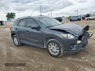 2014 Mazda CX-5 Touring z VIN JM3KE2CY7E0308580, wystawiony jako Copart lot #60565835 z przebiegiem 92 708 mil mil oraz Szkoda całkowita • Salvage title. Historia ofert i sprzedaży dostępna na DreamBid. Obrazek 4.