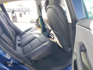 2025 Tesla Model 3 Long Range with VIN 5YJ3E1EA2SF915586, listed as a IAAI auction lot 41495870 with 4 mi miles and . Bid and sale history available at DreamBid. Image 8.