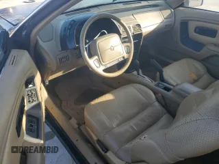 1994 Chrysler LeBaron z VIN 1C3EU4537RF286710, wystawiony jako Copart lot #52610475 z przebiegiem 64 533 mil mil oraz Szkody całkowita. Historia ofert i sprzedaży dostępna na DreamBid. Obrazek 8.