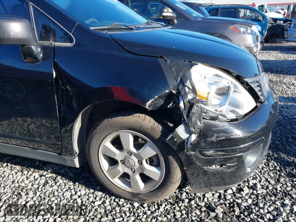 2009 Nissan Versa 1.8 SL with VIN 3N1BC13E59L406937, listed as a IAAI auction lot 41387158 with 149,234 mi miles. Bid and sale history available at carsss.com. Image 6.