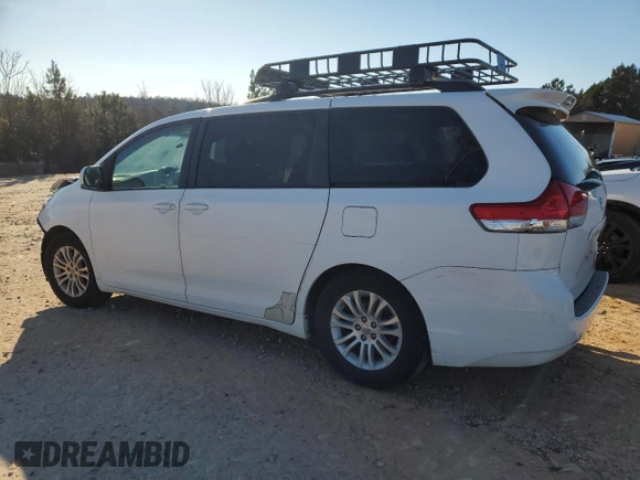 2011 Toyota Sienna XLE AAS с VIN 5TDYK3DC2BS094482, выставлен на аукционе Copart как лот 41777475 с пробегом 183 545 миль миль и Списание • Salvage title. История ставок и продаж доступна на DreamBid. Изображение 2.