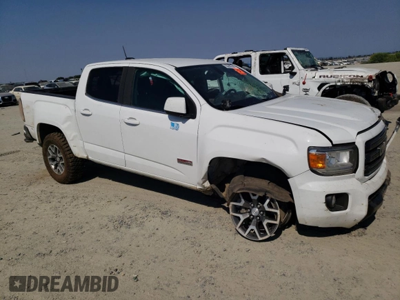 2019 GMC Canyon 4WD All Terrain w/Cloth with VIN 1GTG6FEN8K1138189, listed as a Copart auction lot 65260244 with 143,438 mi miles and Salvage Title. Bid and sale history available at carsss.com. Image 4.