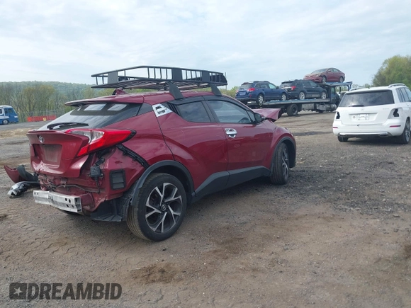 2018 Toyota C-HR XLE with VIN NMTKHMBX7JR010783, listed as a IAAI auction lot 42173610 with 93,320 mi miles and . Bid and sale history available at DreamBid. Image 4.