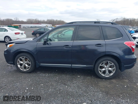 2015 Subaru Forester Touring with VIN JF2SJAWC0FH585722, listed as a IAAI auction lot 41734016 with 90,728 mi miles and . Bid and sale history available at DreamBid. Image 14.