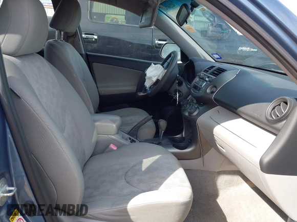 2010 Toyota RAV4 with VIN JTMZF4DV1A5017557, listed as a IAAI auction lot 42268749 with 186,735 mi miles and . Bid and sale history available at DreamBid. Image 5.