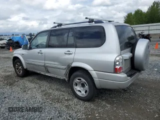 2006 Suzuki XL7 z VIN JS3TX92V564102483, wystawiony jako Copart lot #57185865 z przebiegiem 152 864 mil mil oraz Szkoda całkowita • Salvage title. Historia ofert i sprzedaży dostępna na DreamBid. Obrazek 2.