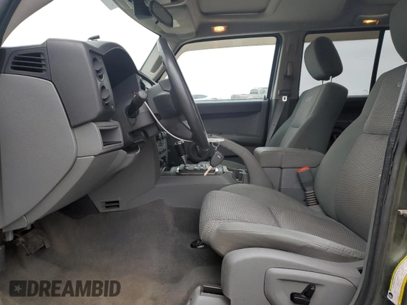 2007 Jeep Commander Sport z VIN 1J8HG48P97C622153, wystawiony jako Copart lot #50291165 z przebiegiem 113 516 mil mil oraz Szkoda całkowita • Salvage title. Historia ofert i sprzedaży dostępna na DreamBid. Obrazek 7.