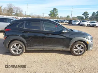 2023 Hyundai Kona SEL with VIN KM8K62AB0PU938484, listed as a IAAI auction lot 41722445 with 52,058 mi miles and . Bid and sale history available at DreamBid. Image 13.