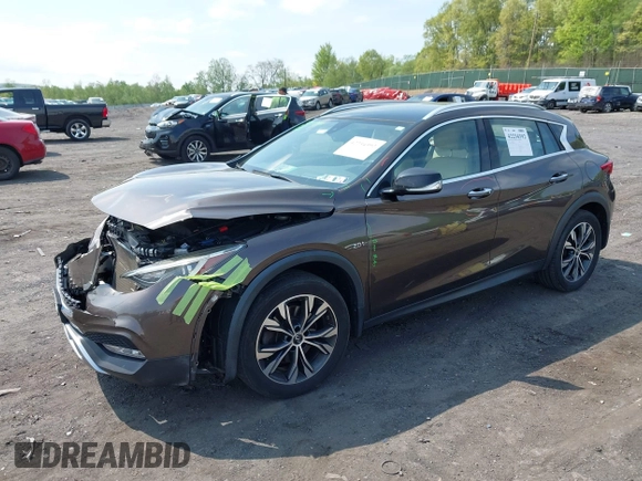 2018 Infiniti QX30 Premium z VIN SJKCH5CR0JA051889, wystawiony jako IAAI lot #42234392 z przebiegiem 104 095 mil mil oraz . Historia ofert i sprzedaży dostępna na DreamBid. Obrazek 17.