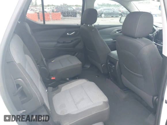 2019 Chevrolet Traverse LT Cloth z VIN 1GNERGKW2KJ128010, wystawiony jako IAAI lot #42173006 z przebiegiem 93 328 mil mil oraz . Historia ofert i sprzedaży dostępna na DreamBid. Obrazek 8.