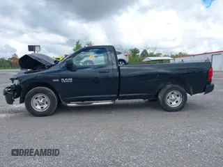 2015 Ram 1500 Tradesman with VIN 3C6JR7DTXFG637822, listed as a IAAI auction lot 40462420 with 122,747 mi miles and . Bid and sale history available at DreamBid. Image 13.