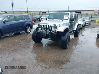 2012 Jeep Wrangler Unlimited Call of Duty MW3 with VIN 1C4BJWFG7CL281844, listed as a IAAI auction lot 42494946 with 93,669 mi miles and . Bid and sale history available at DreamBid. Image 17.