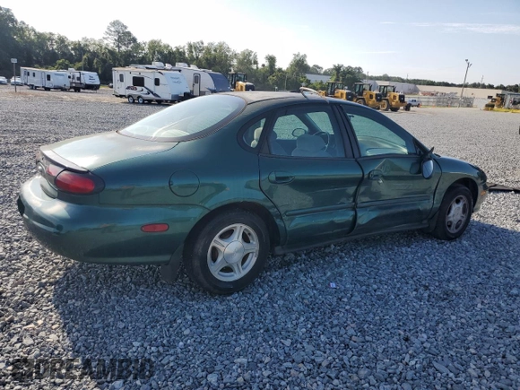 1999 Ford Taurus SE with VIN 1FAFP53U2XG184723, listed as a Copart auction lot 60787115 with 128,277 mi miles and Salvage title. Bid and sale history available at DreamBid. Image 3.