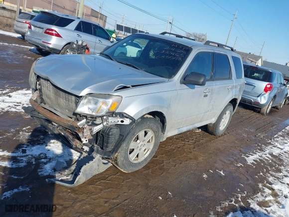 2010 Mercury Mariner with VIN 4M2CN8B72AKJ30465, listed as a IAAI auction lot 41554592 with 110,973 mi miles. Bid and sale history available at carsss.com. Image 2.