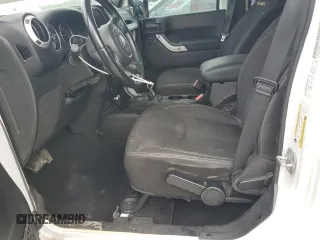 2014 Jeep Wrangler Unlimited Sahara with VIN 1C4BJWEG8EL266340, listed as a Copart auction lot 57809465 with 121,191 mi miles and Salvage title. Bid and sale history available at DreamBid. Image 7.