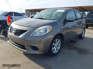 2014 Nissan Versa SV with VIN 3N1CN7AP4EL832666, listed as a IAAI auction lot 41308540 with 136,468 mi miles. Bid and sale history available at carsss.com. Image 2.