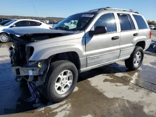 1999 Jeep Grand Cherokee Laredo with VIN 1J4GW58NXXC776438, listed as a Copart auction lot 84412044 with 163,060 mi miles and Salvage Title. Bid and sale history available at carsss.com. Image 1.