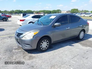 2016 Nissan Versa S Plus with VIN 3N1CN7AP6GL901666, listed as a IAAI auction lot 42126865 with 158,067 mi miles. Bid and sale history available at carsss.com. Image 2.