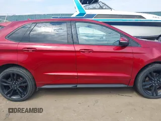 2019 Ford Edge ST z VIN 2FMPK4AP8KBC11018, wystawiony jako IAAI lot #41909033 z przebiegiem 83 576 mil mil oraz . Historia ofert i sprzedaży dostępna na DreamBid. Obrazek 14.