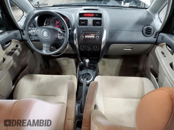 2009 Suzuki SX4 Man FWD with VIN JS2YC412496200218, listed as a Copart auction lot 46938825 with 63,909 mi miles and Salvage Title. Bid and sale history available at carsss.com. Image 8.