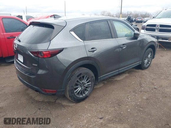 2017 Mazda CX-5 Touring with VIN JM3KFACL3H0148312, listed as a IAAI auction lot 41844634 with 68,534 mi miles and . Bid and sale history available at carsss.com. Image 4.