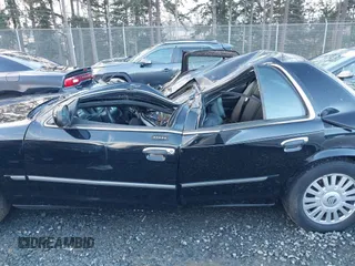 2008 Mercury Grand Marquis z VIN 2MHHM75V98X614175, wystawiony jako IAAI lot #41179107 z przebiegiem 114 607 mil mil oraz . Historia ofert i sprzedaży dostępna na DreamBid. Obrazek 14.