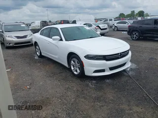 2015 Dodge Charger SE with VIN 2C3CDXBG2FH747922, listed as a IAAI auction lot 42086247 with 96,981 mi miles and . Bid and sale history available at carsss.com. Image 1.