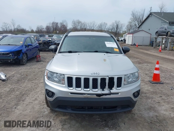 2012 Jeep Compass Sport with VIN 1C4NJDBB4CD624163, listed as a IAAI auction lot 42025783 with 148,928 mi miles. Bid and sale history available at carsss.com. Image 12.