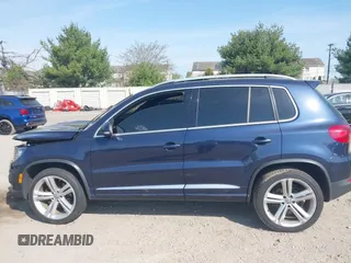 2014 Volkswagen Tiguan S z VIN WVGBV3AX7EW545538, wystawiony jako IAAI lot #42083281 z przebiegiem 129 227 mil mil oraz . Historia ofert i sprzedaży dostępna na DreamBid. Obrazek 14.