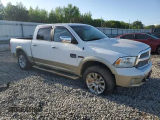 2015 Ram 1500 Laramie Longhorn with VIN 1C6RR7PM8FS560299, listed as a Copart auction lot 53874365 with 116,339 mi miles and Salvage title. Bid and sale history available at DreamBid. Image 4.