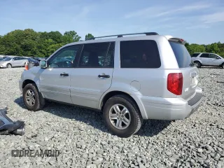 2005 Honda Pilot EX-L with VIN 2HKYF18505H500452, listed as a Copart auction lot 57552535 with 282,733 mi miles and Salvage title. Bid and sale history available at DreamBid. Image 2.