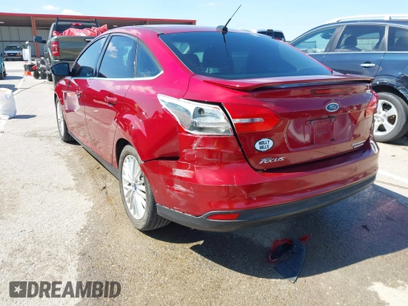 2015 Ford Focus Titanium with VIN 1FADP3J29FL230664, listed as a IAAI auction lot 41870083 with 125,578 mi miles and . Bid and sale history available at DreamBid. Image 6.