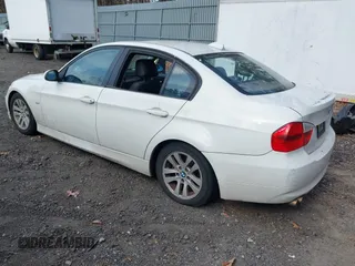 2007 BMW 3 Series 328xi with VIN WBAVC93577KX53139, listed as a IAAI auction lot 41719473 with 155,716 mi miles. Bid and sale history available at carsss.com. Image 3.