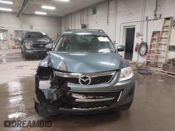 2012 Mazda CX-9 Touring z VIN JM3TB3CV8C0358099, wystawiony jako IAAI lot #41478110 z przebiegiem 151 716 mil mil oraz . Historia ofert i sprzedaży dostępna na DreamBid. Obrazek 13.