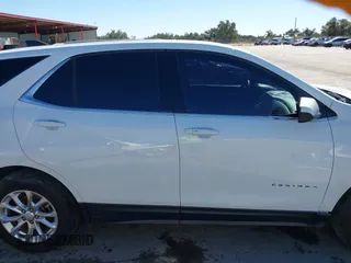 2020 Chevrolet Equinox LT with VIN 2GNAXUEV2L6208430, listed as a IAAI auction lot 41217793 with 117,822 mi miles and . Bid and sale history available at DreamBid. Image 13.